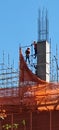 Brave workers standing around ten storeys up in the air in Bangkok Royalty Free Stock Photo