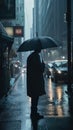 Braving the Storm Person Holding Umbrella in Heavy Rain Facing Away from Camera Cinematic Royalty Free Stock Photo