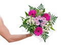 Brawny man's hand with a bouquet of flowers Royalty Free Stock Photo