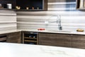 Brawon kitchen cabinets with white kitchen granite countertop. Counter concept.