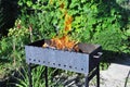 Brazier with burning charcoal for cooking kebabs, grilling