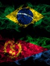 Brazil, Brazilian vs Eritrea, Eritrean smoky mystic flags placed side by side. Thick colored silky abstract smoke flags