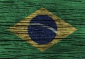 Brazil flag with high detail of old wooden background . Royalty Free Stock Photo