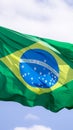 Brazil national flag textile cloth waving on top, blue sky brazil, patriotism concept