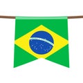 Brazil national flags hangs on the ropes on white background. The symbol of the state in the pennant hanging on the rope. Royalty Free Stock Photo