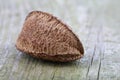 Brazil nut on wooden background Royalty Free Stock Photo