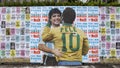 Mural depicting Brazilian soccer legend Pele embracing late Argentinean soccer star Diego Maradona