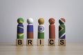 Brazil Russia India China and South Africa flag print screen on wooden figure for BRICS economic international cooperation concept Royalty Free Stock Photo