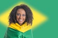 Brazilian woman fan celebrating on football match on white background. Brazil colors. Royalty Free Stock Photo