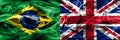 Brazil vs United Kingdom smoke flags placed side by side