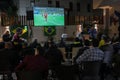 The Brazilian ambassador to Palestine, Francisco Mauro Uland Brasil, watches the Brazil national team match against Switzerland