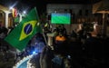 The Brazilian ambassador to Palestine, Francisco Mauro Uland Brasil, watches the Brazil national team match against Switzerland