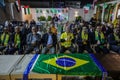 The Brazilian ambassador to Palestine, Francisco Mauro Uland Brasil, watches the Brazil national team match against Switzerland