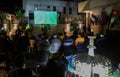 The Brazilian ambassador to Palestine, Francisco Mauro Uland Brasil, watches the Brazil national team match against Switzerland