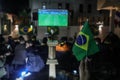 The Brazilian ambassador to Palestine, Francisco Mauro Uland Brasil, watches the Brazil national team match against Switzerland