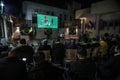 The Brazilian ambassador to Palestine, Francisco Mauro Uland Brasil, watches the Brazil national team match against Switzerland