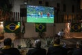 The Brazilian ambassador to Palestine, Francisco Mauro Uland Brasil, watches the Brazil national team match against Switzerland