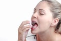 Brazilian beautiful woman eating a brigadeiro