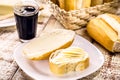 Brazilian bread called French bread, bald or baguette, served with black coffee and butter, a traditional Brazilian bakery Royalty Free Stock Photo