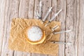 Brazilian cream doughnuts surrounded by various syringes and ampoules with insulin_top view