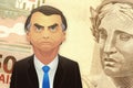 Santo AndrÃÂ©/SÃÂ£o Paulo/Brazil - April 10, 2020: Illustration of the brazilian president Jair Bolsonaro in front of a BRL banknote