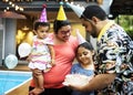 Brazilian family enjoying daughter birthday party