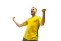 Brazilian fan celebrating on white background Royalty Free Stock Photo