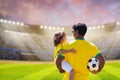 Brazilian father and son play football. Go Brazil