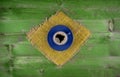 Brazilian flag made of a cup of coffee with foam as the border o