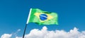 Brazilian flag waving against blue sky Royalty Free Stock Photo