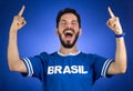 Brazilian supporter of National football team is celebrating, ch Royalty Free Stock Photo