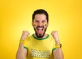 Brazilian supporter of National football team is celebrating, ch Royalty Free Stock Photo