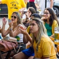 Brazilian Girls Watching World Cup Match on TV at a Bar