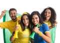 Brazilian group of fans celebrating on football match on white b