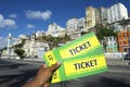 Brazilian Hand Holding Two Tickets to Event in Pelourinho Salvador Brazil