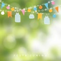 Brazilian june party, festa junina. String of lights, jar lanterns. Birthday party decoration. Blurred background. Royalty Free Stock Photo