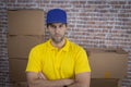 Brazilian mailman with arms crossed