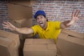 Brazilian mailman lost in a lot of boxes