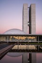 Brazilian national congress at nightfall with reflections on lake