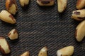 Brazilian nuts in a bowl on a wooden table. Kitchen background