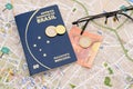 Brazilian Passport, Euros, Glasses And Map For Travel Abroad.