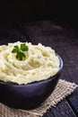 Brazilian potato cream, called `purÃÂª potato`, served in handmade clay pot, vegan and healthy food.