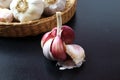 Brazilian seasoning. Purple garlic bulb with garlic in a wicker basket