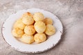 Brazilian snack cheese bread (pao de queijo) on plate Royalty Free Stock Photo