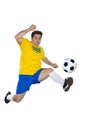 Brazilian Soccer player, jumping, yellow and blue.
