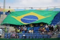 Brazilian sport fans supporting team Brazil during the Rio 2016 Olympic Games at the Olympic Park