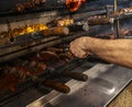 Brazilian style beef ribs Barbecue grill on skewers at a churrascaria steakhouse