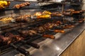 Brazilian style beef ribs Barbecue grill on skewers at a churrascaria steakhouse