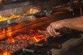 Brazilian style beef ribs Barbecue grill on skewers at a churrascaria steakhouse