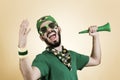 Brazilian supporter of National football team is celebrating, ch Royalty Free Stock Photo